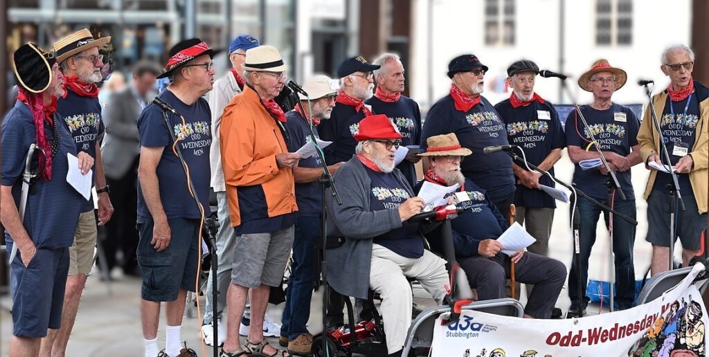Odd Wednesday Men singing at the Fareham Showcase event at the bandstand 5th July 2025 - photo credit Gerry Edwards